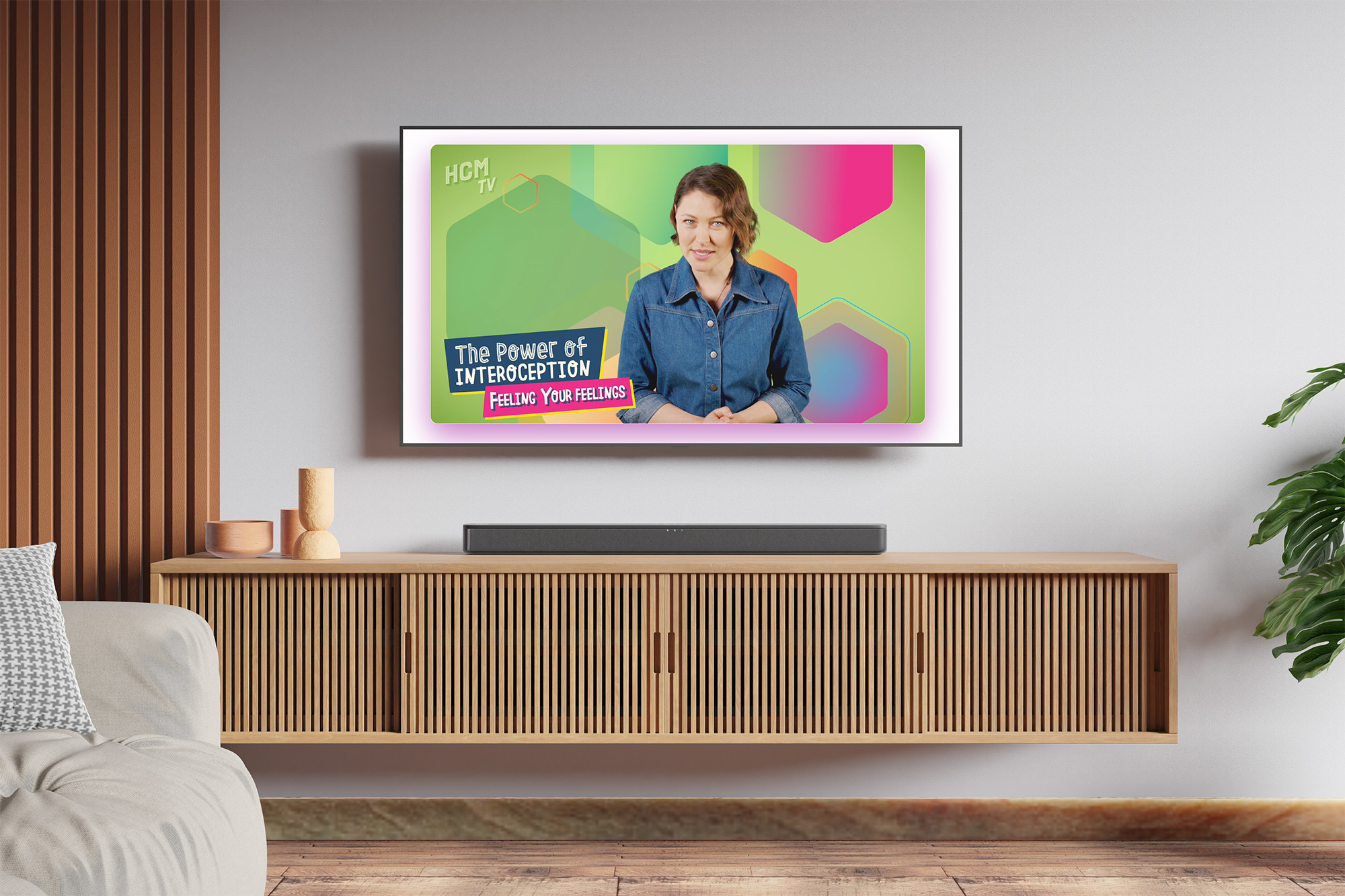 HCM TV course content playing on a living-room TV